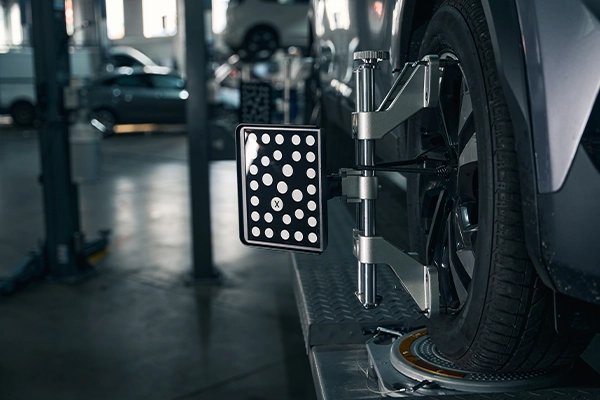 Car on wheel alignment rack